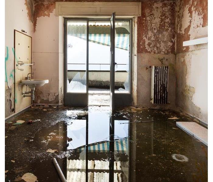 Standing water inside a room.